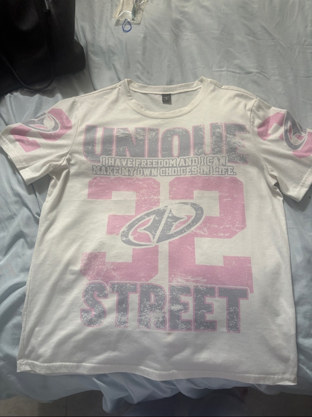 White Graphic Tee with Pink 'Unique 32 Street' Print
